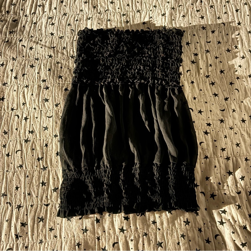 January 7 black stretchy halter top with ruching. Possibly size S.
